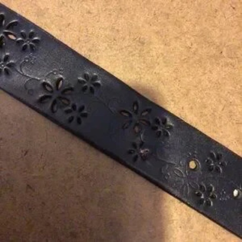 A set of two belts, one black floral belt & one a golden brown belt - Picture 4 of 5